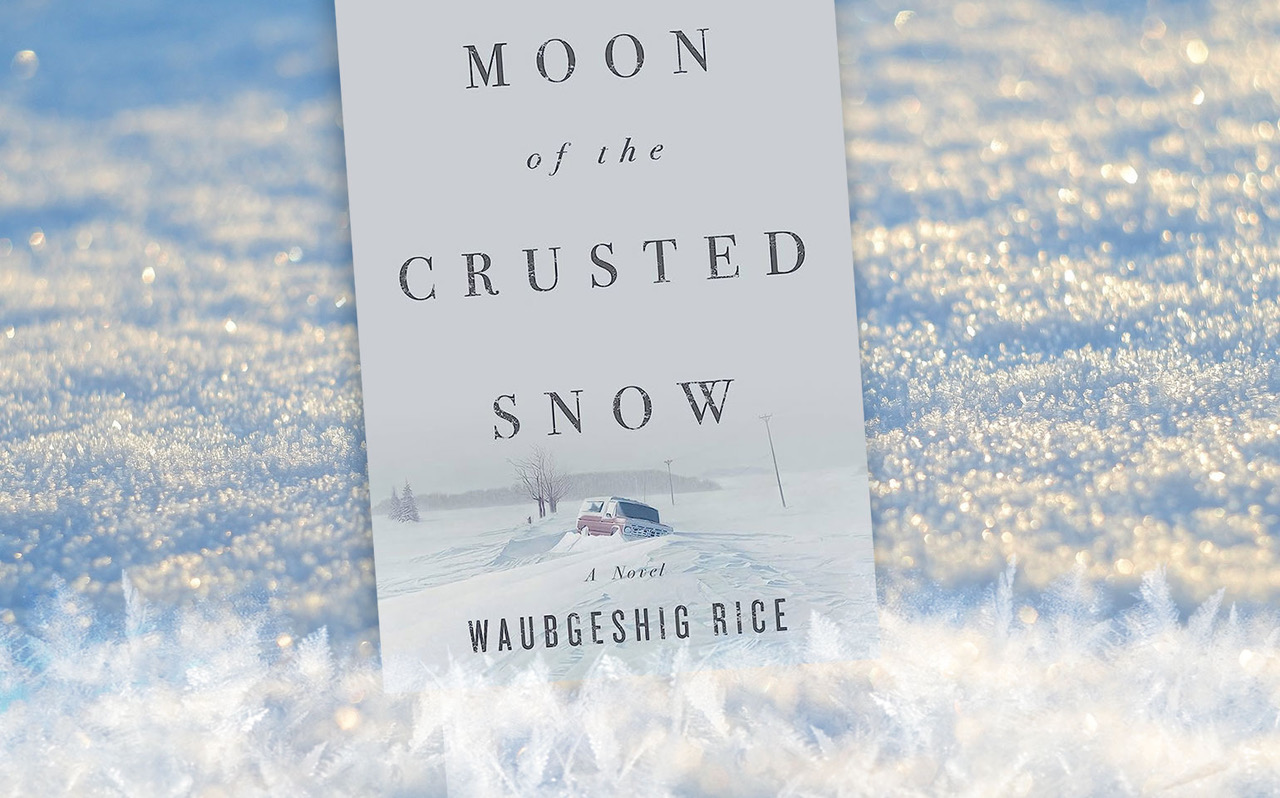 The cover of Moon of the Crusted Snow is shown against a cloudy sky backdrop.