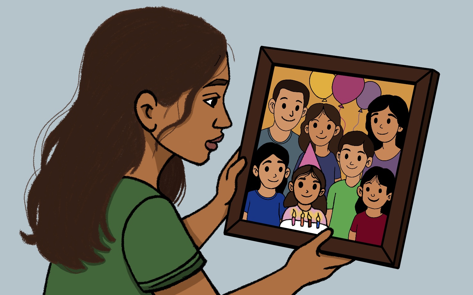A woman looks at a picture of many people making up a family.